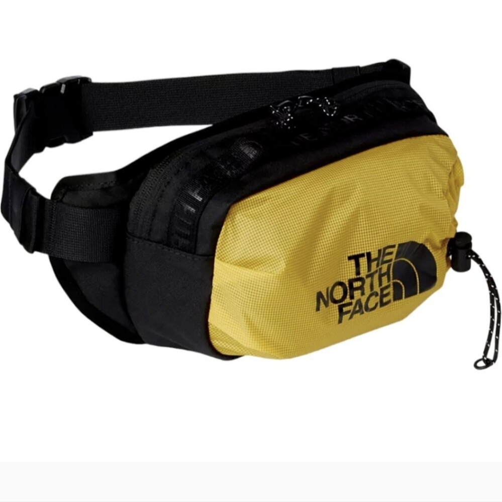 The North Face Bozer hip pack III- 3L. New with tags. Black and mineral gold